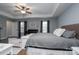 Large main bedroom with king bed and ceiling fan at 123 Kingfisher Dr, Mooresville, NC 28117