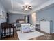 Main bedroom with king bed and crib at 123 Kingfisher Dr, Mooresville, NC 28117