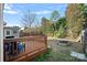 Deck and backyard with raised garden beds at 13917 Sugar Oats Ln, Charlotte, NC 28213