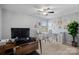 Home office with standing desk and plenty of natural light at 13917 Sugar Oats Ln, Charlotte, NC 28213