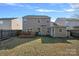 Back of house with deck and detached shed at 13917 Sugar Oats Ln, Charlotte, NC 28213