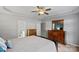 Main bedroom with ensuite bathroom and large dresser at 13917 Sugar Oats Ln, Charlotte, NC 28213