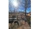 Wooden deck with seating, overlooking backyard at 1426 Reid Harkey Rd, Matthews, NC 28105