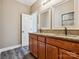 Bathroom boasts granite countertops, wood cabinets, and a tiled shower at 1744 White Fawn Ln, Rock Hill, SC 29730