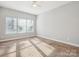 Bright bedroom with neutral walls and carpeting, featuring a large window at 1744 White Fawn Ln, Rock Hill, SC 29730