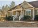 House exterior with front porch and landscaping at 1744 White Fawn Ln, Rock Hill, SC 29730