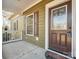 Front door with dark brown finish and sidelights at 1744 White Fawn Ln, Rock Hill, SC 29730