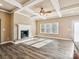 Living room with hardwood floors, a fireplace, and coffered ceilings at 1744 White Fawn Ln, Rock Hill, SC 29730