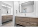 Modern bathroom with double vanity and updated fixtures at 19216 Wildcat Trl, Davidson, NC 28036