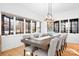 Dining room with farmhouse table and large windows at 19216 Wildcat Trl, Davidson, NC 28036