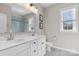 Bathroom with double vanity, tile shower, and patterned floor at 298 Bouchard Dr, Waxhaw, NC 28173