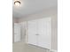 Spacious bedroom with double doors and ample closet space at 298 Bouchard Dr, Waxhaw, NC 28173