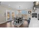 Bright eat-in kitchen with view to backyard and access to patio at 298 Bouchard Dr, Waxhaw, NC 28173