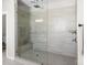 Large walk-in shower with glass enclosure and built-in seat at 298 Bouchard Dr, Waxhaw, NC 28173