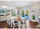 Dining area with hardwood floors, chandelier, and access to backyard at 3001 Cedric Ct, Fort Mill, SC 29715