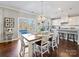 Bright dining area with hardwood floors and view of backyard at 3001 Cedric Ct, Fort Mill, SC 29715