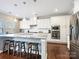 Modern kitchen with white cabinets and granite countertops at 3001 Cedric Ct, Fort Mill, SC 29715