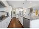 Modern kitchen with white cabinets, granite countertops and island at 3001 Cedric Ct, Fort Mill, SC 29715