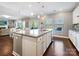 Modern kitchen with island, white cabinets and granite countertops at 3001 Cedric Ct, Fort Mill, SC 29715