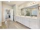 Double vanity bathroom with a view of the bedroom and walk-in shower at 3001 Cedric Ct, Fort Mill, SC 29715