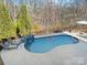 Relaxing pool with stone waterfall feature at 3001 Cedric Ct, Fort Mill, SC 29715