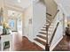 Elegant staircase with wood treads and white railing at 3001 Cedric Ct, Fort Mill, SC 29715