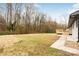 Large backyard with deck and wooded area at 375 Woodwedge Cir, Salisbury, NC 28144