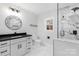 Modern bathroom with marble tile, a floating vanity, and a walk in shower at 375 Woodwedge Cir, Salisbury, NC 28144