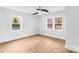 Spacious bedroom featuring wood floors and large windows at 375 Woodwedge Cir, Salisbury, NC 28144