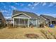 Home's back with screened porch and patio at 517 Trillium Way, Belmont, NC 28012