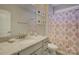 Bathroom with single vanity and patterned shower curtain at 517 Trillium Way, Belmont, NC 28012