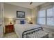 Bright bedroom with window seating and neutral decor at 517 Trillium Way, Belmont, NC 28012