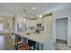 Modern kitchen with white cabinets, granite countertops, and an island at 517 Trillium Way, Belmont, NC 28012