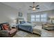 Main bedroom with king-size bed and ceiling fan at 517 Trillium Way, Belmont, NC 28012