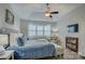 Spacious main bedroom with king bed and built-in shelving at 517 Trillium Way, Belmont, NC 28012