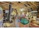 Unfinished attic space with storage shelving and boxes at 517 Trillium Way, Belmont, NC 28012