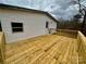 Newly built wooden deck extends from the back of the house at 568 Mahaffey Dr, Salisbury, NC 28146