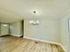 Dining area with a chandelier and laminate wood flooring at 568 Mahaffey Dr, Salisbury, NC 28146