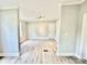 Bright dining room with light gray walls and wood-look flooring at 568 Mahaffey Dr, Salisbury, NC 28146