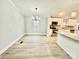 Dining area with a chandelier and laminate wood flooring at 568 Mahaffey Dr, Salisbury, NC 28146