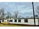 Single-wide manufactured home with a new metal roof and deck at 568 Mahaffey Dr, Salisbury, NC 28146