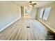 Spacious living room featuring LVP flooring and a ceiling fan at 568 Mahaffey Dr, Salisbury, NC 28146