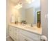 Double vanity bathroom with a large mirror and light fixtures at 810 Ayrshire Ave, Fort Mill, SC 29708