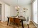 Cozy dining area featuring a wood table, stylish chairs, and a decorative wall at 810 Ayrshire Ave, Fort Mill, SC 29708