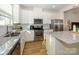 Modern kitchen with stainless steel appliances and island at 810 Ayrshire Ave, Fort Mill, SC 29708