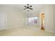 Bright bedroom featuring a large window and neutral decor at 9182 Bonnie Briar Cir, Charlotte, NC 28277