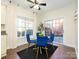 Cozy breakfast nook with bright windows, dark wood flooring, and sliding doors at 9182 Bonnie Briar Cir, Charlotte, NC 28277