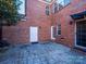 Brick courtyard with a private entrance and stamped concrete at 9182 Bonnie Briar Cir, Charlotte, NC 28277