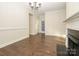 Bright dining room features hardwood floors and a fireplace at 9182 Bonnie Briar Cir, Charlotte, NC 28277