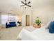 Bright main bedroom showcasing ample space, a ceiling fan, and sitting area at 9182 Bonnie Briar Cir, Charlotte, NC 28277